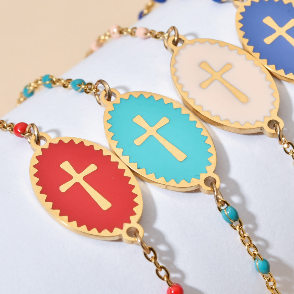 Colorful necklaces with circular pendants featuring a symbol on a light background