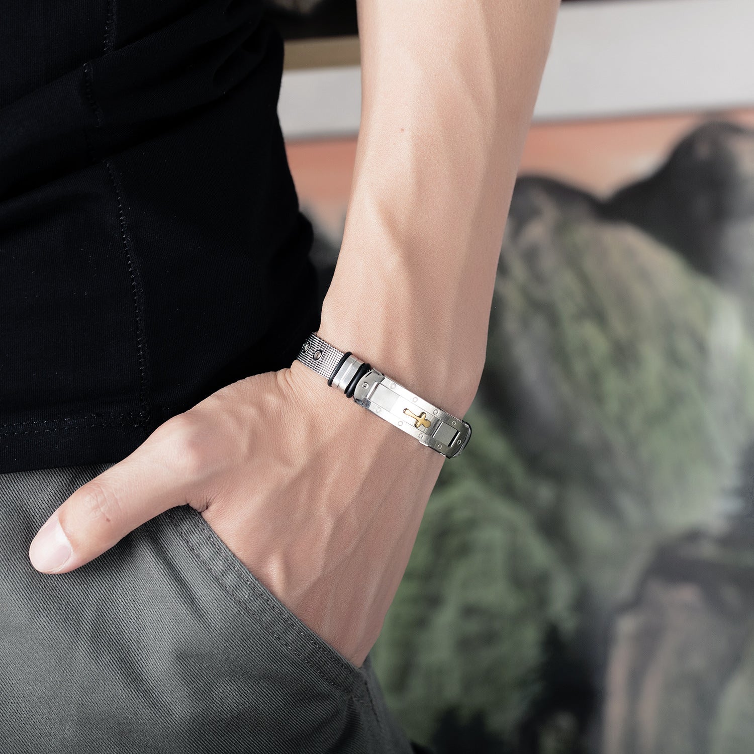 Person wearing a bracelet with a scenic background