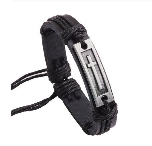 Black braided leather bracelet with a silver cross charm on a white background