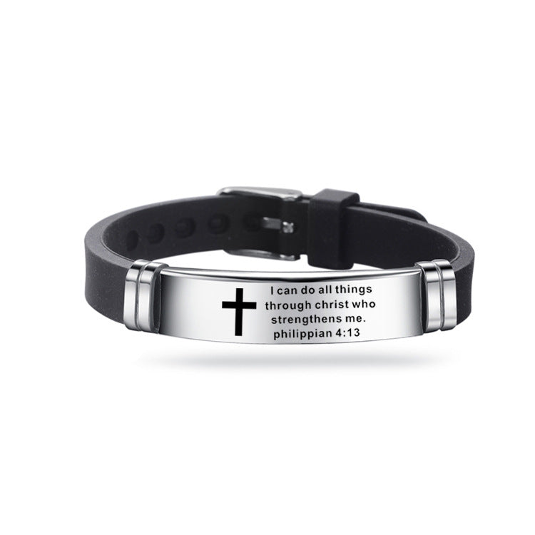 Black and silver bracelet with a cross and Bible verse on a white background