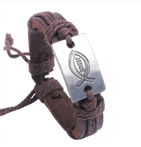Brown braided bracelet with a silver tag featuring the Jesus Fish symbol on a white background
