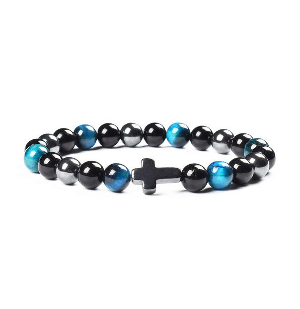 Bracelet with black, blue, and silver beads on a white background